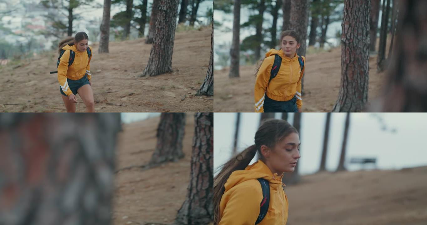 4k视频片段，一名年轻女子在远足时戴着背包