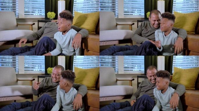 多种族男孩和继父在家看电视