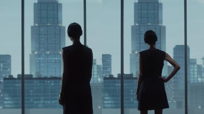 垂直屏幕: 成功的女商人穿着时髦的衣服，看着窗外的大城市。自信的从事金融项目的女首席执行官。工作计划