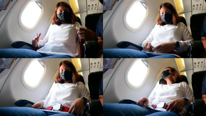 女性乘客在飞机上系好安全带