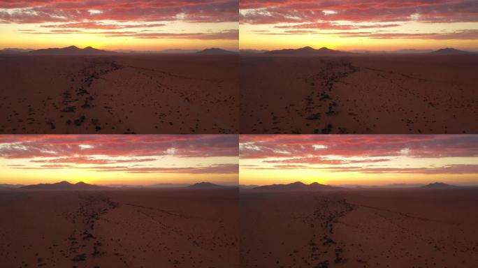 WS宁静的日落天空在广阔的沙漠景观，纳米比亚，非洲