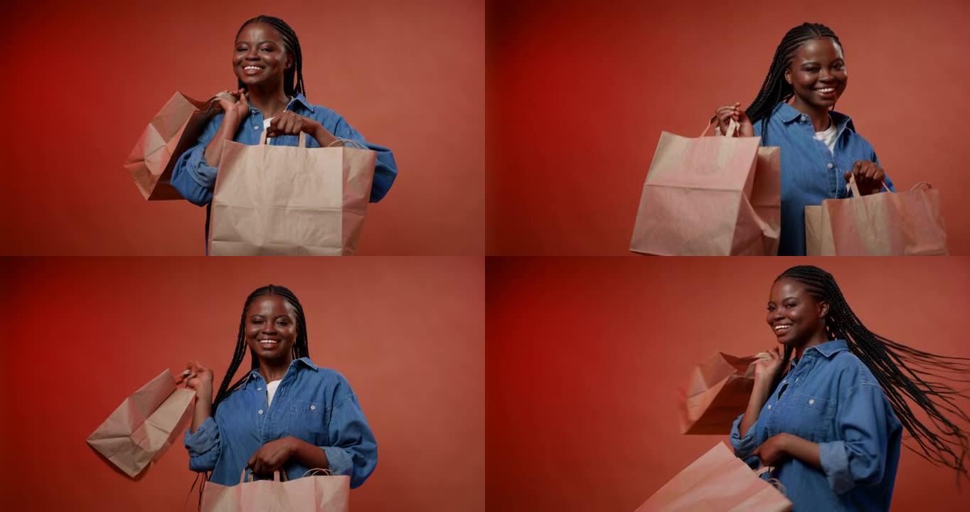 一位年轻的黑皮肤博客作者展示了她的手工艺品回收购物袋