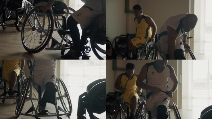 男运动员为篮球比赛准备运动轮椅。