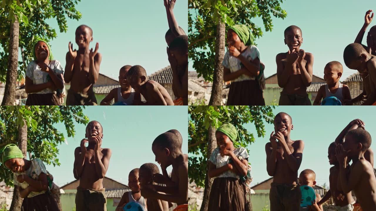 一群非洲孩子在农村地区的水下欢笑、跳跃和玩耍。黑人孩子快乐地庆祝生活。童年的美与本质，乡村生活的天真