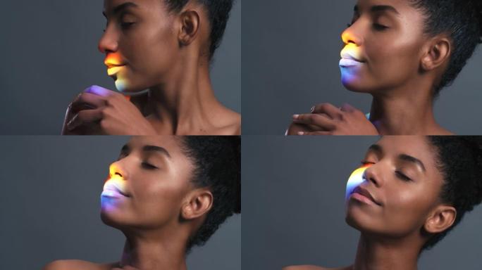五颜六色的光彩虹发光，身体健康和黑人女性与豪华护肤，皮肤美容护理或模型健康与灰色模型工作室背景。身体