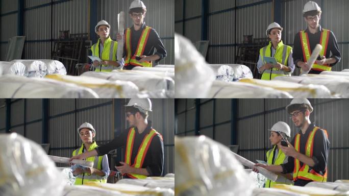 男女工业工程师在工业制造工厂使用笔记本电脑