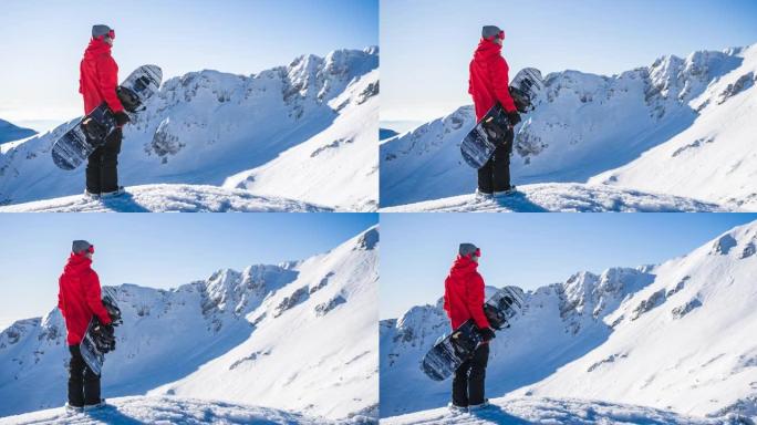 山顶上的滑雪者在阳光明媚的日子里欣赏冬季景观，并准备上坡