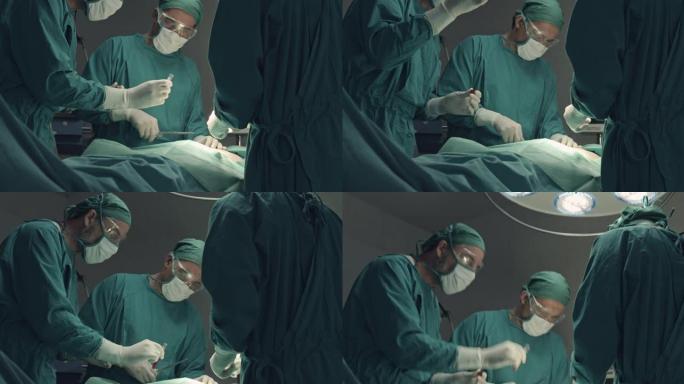 在手术室进行外科手术的医疗小组