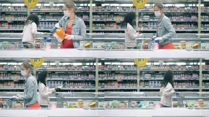 一位戴着口罩的女士正在超市购买冷冻食品。买家，食品、杂货店、超市的顾客。