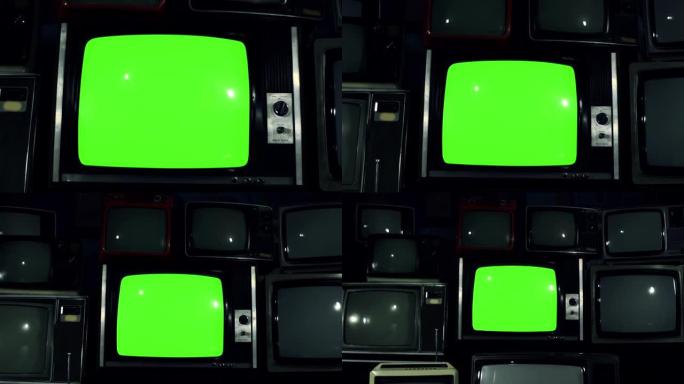 绿色屏幕堆叠复古电视。多莉出去了。4k分辨率。