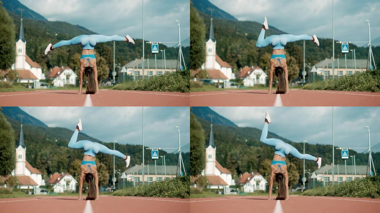 SLO MO运动女子倒立姿势在空中移动双腿