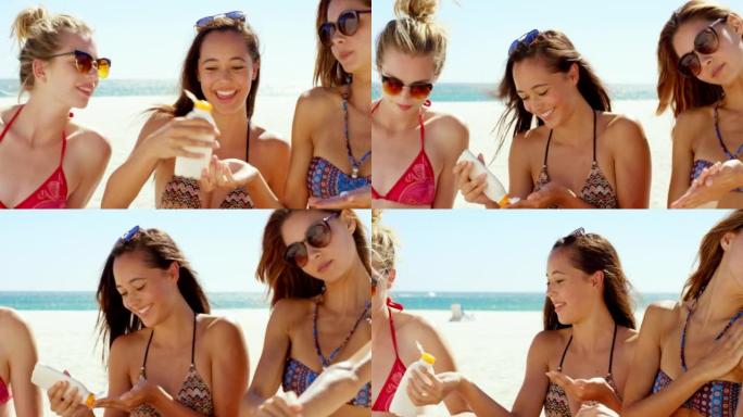 4k视频片段，一名妇女与朋友在海滩上涂抹防晒霜