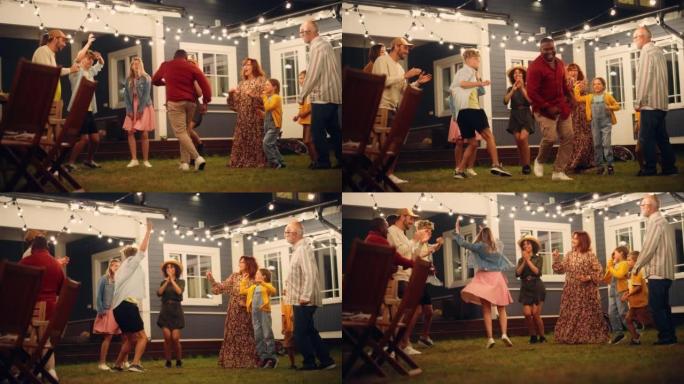 父母，孩子和多元文化的朋友在家里的花园派对迪斯科活动中一起跳舞。年轻人和老年人放松，在夏天的晚上玩得
