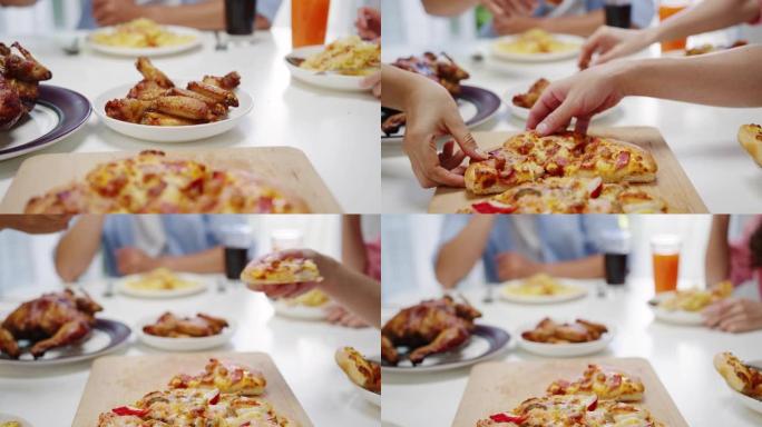 餐桌上的披萨特写镜头，年轻的朋友们围坐在一起吃午饭，在家拿一份。