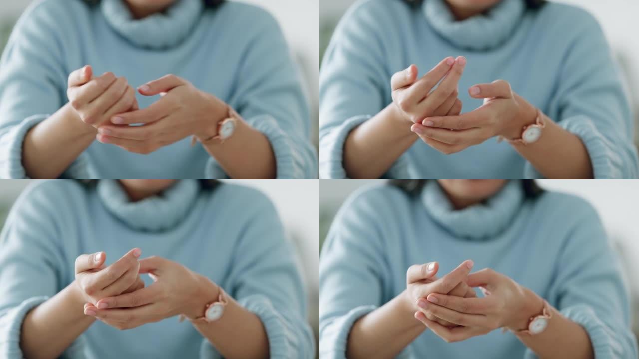 女人在她的手上敲开指关节，焦虑和紧张的手势。关闭年轻女性的压力，焦虑和压力，习惯弹出手指和手的关节，