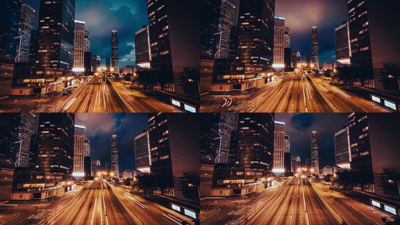 香港市景白天到晚上现代建筑下的道路和隧道交通灯的延时场景