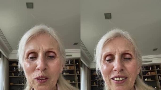手机网络摄像头查看老年妇女制作语音记录视频