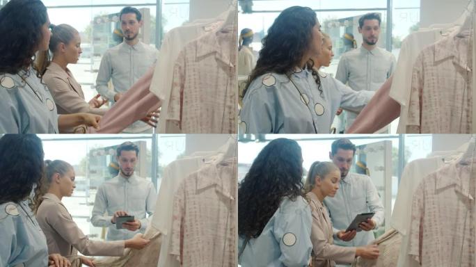 友好的推销员与女性顾客交谈，选择衣服并在商店中使用平板电脑