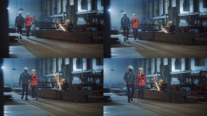 两名重工业工程师走进钢铁厂，使用平板电脑并讨论工作。工业工人在背景中使用角磨机。黑人非洲裔美国专家与
