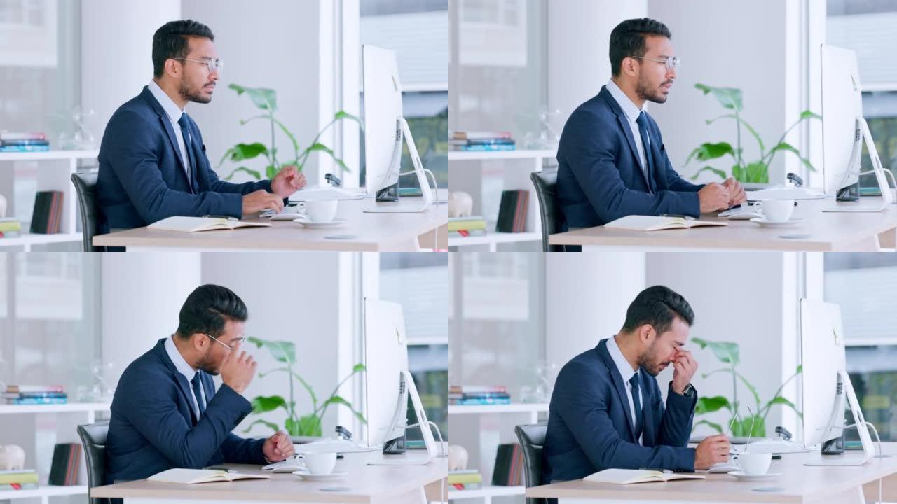 压力大的男性业务经理，在电脑前工作头痛。沮丧的上班族在为最后期限感到压力时摘下了眼镜。公司领导已经厌