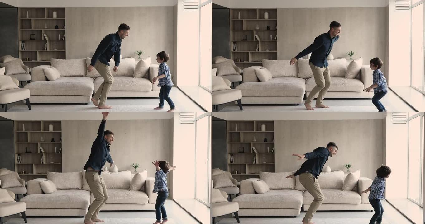 开朗的父亲和小儿子在家里跳舞