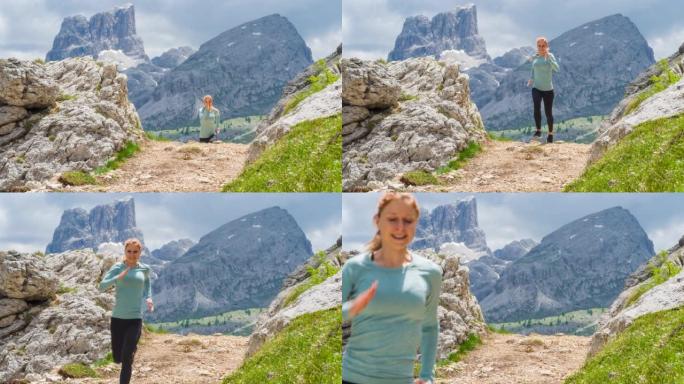 女跑步者在山区的岩石小径上奔跑