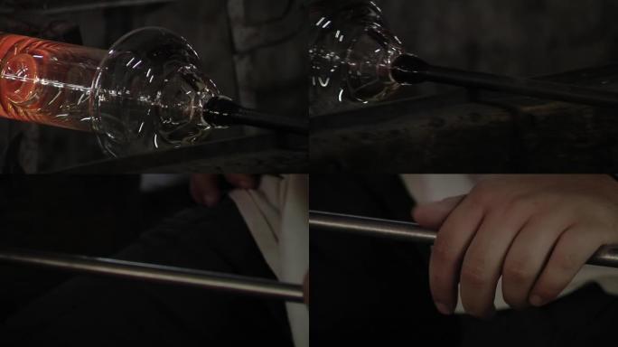 玻璃鼓风机在玻璃厂塑造熔融玻璃的气泡。特写。