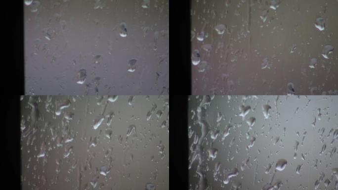 窗户上有水滴的背景，窗户上有雨滴。特写。