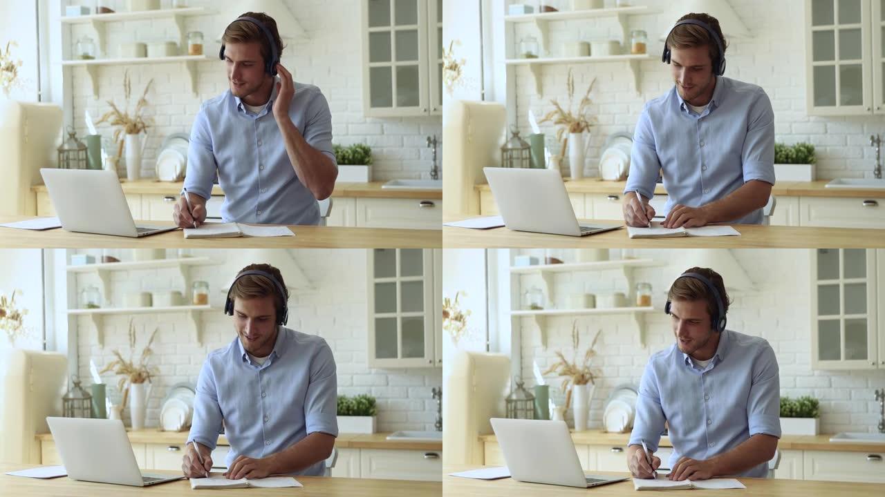 男人使用视频会议应用程序和笔记本电脑与老师一起学习语言