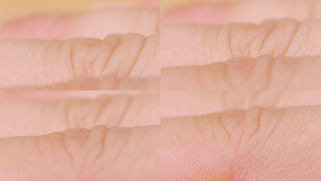 宏观: 一个无法辨认的白皙皮肤女人手指的详细特写镜头。