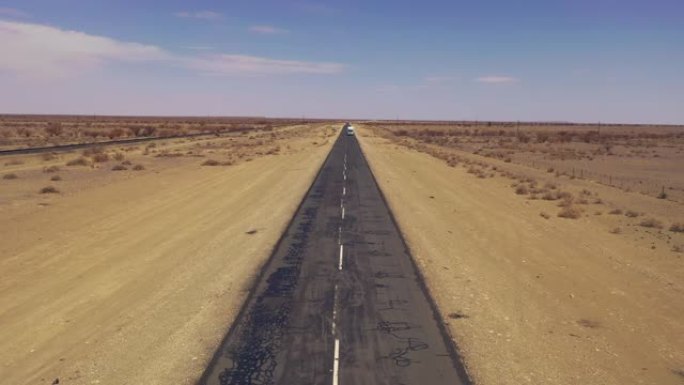 WS Truck driving on remote desert road, Namibia, A