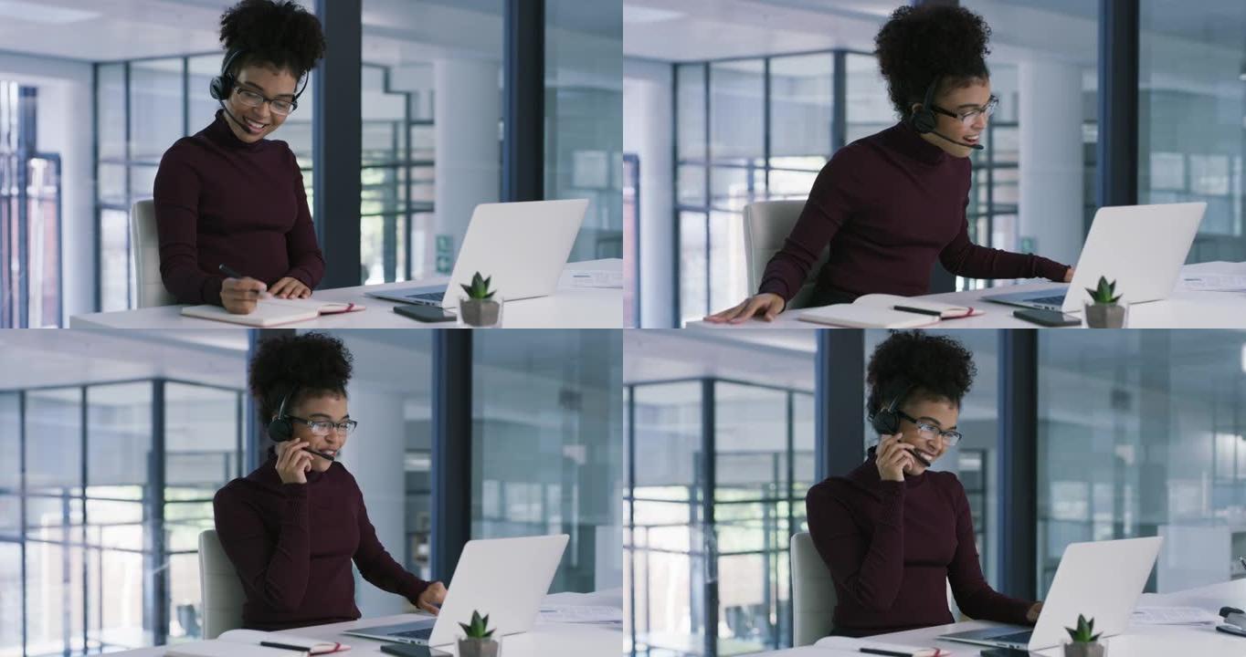 一名年轻女子在现代办公室使用耳机和笔记本电脑的4k视频片段