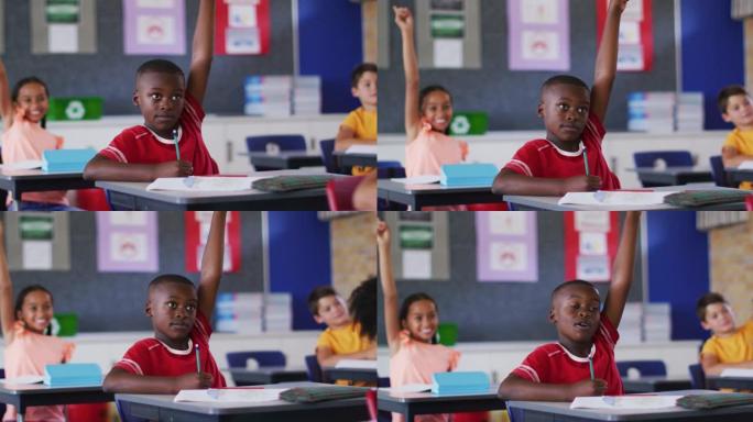 坐在教室里的不同学童在课上举手回答问题
