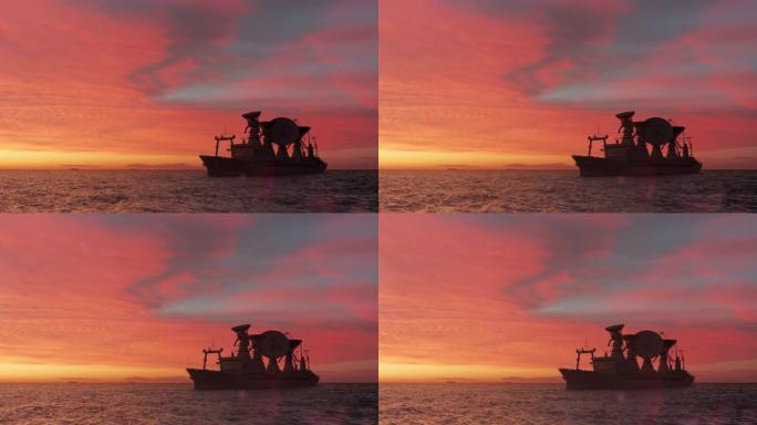 科学船与卫星天线剪影在海上浪漫的日落照明