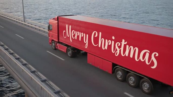 半挂车圣诞卡车沿着一座桥驶向日落