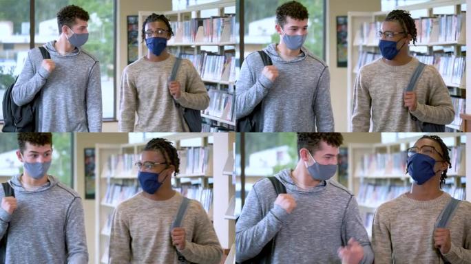 图书馆里的两个年轻人，大学生，口罩