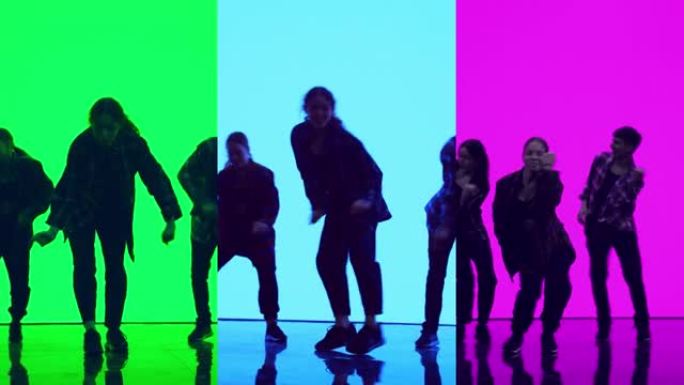 音乐视频剪辑蒙太奇，三个分屏，年轻的专业舞者在工作室表演现代嘻哈舞蹈。