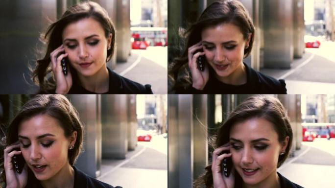 一名年轻女商人用手机打电话的4k视频片段