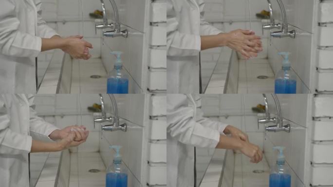 无法辨认的女人根据新型冠状病毒肺炎准则洗手