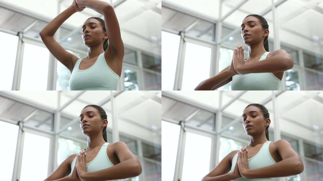 冷静的女人在健身房做瑜伽放松，冥想精神健康禅宗，并在训练锻炼中祈祷平衡和健康。信任呼吸，希望和信仰印