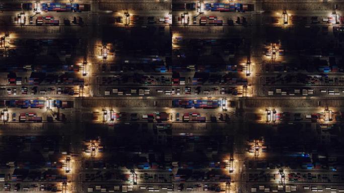 夜间集装箱运输繁忙工业港口的T/L PAN俯视图
