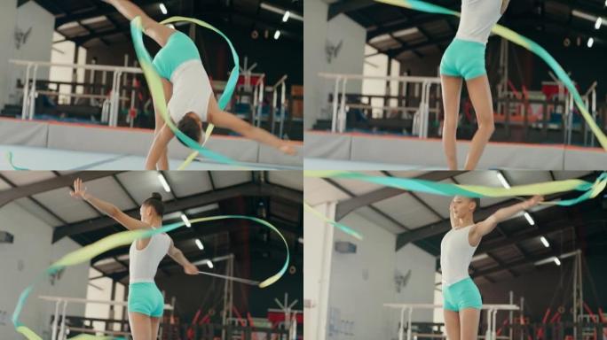体操丝带，女运动员和舞蹈工作室的训练表演艺术，具有活力，创造性的动作和平衡。体操运动员，年轻女孩和体