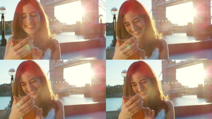 4k视频片段，一名年轻女子在城市外出时检查手机