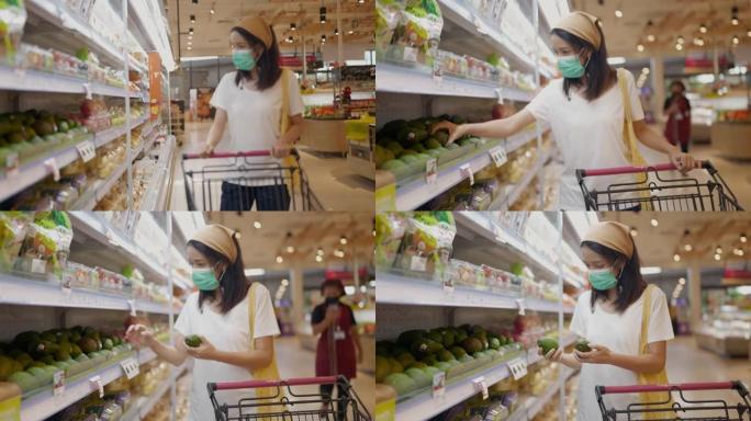 在杂货店戴面膜的亚洲女性。