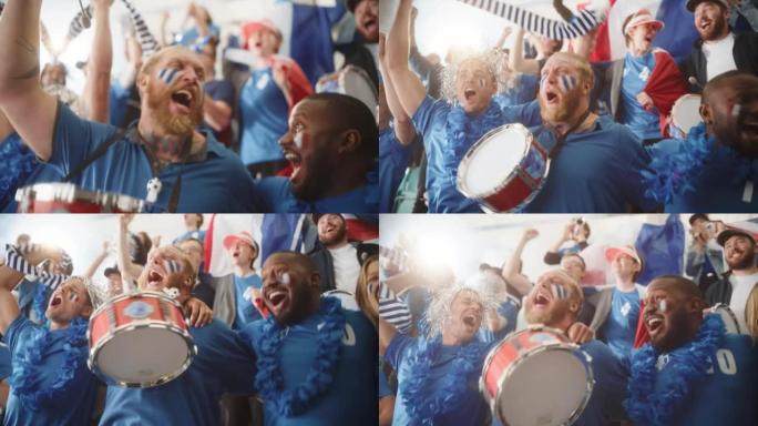 体育馆大事件: 三个不同的球迷，脸上涂着彩绘的脸欢呼，敲鼓，大笑，开心，为足球队获胜而呐喊。人们庆祝