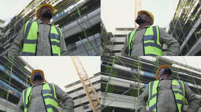 一名成熟男子检查建筑工地的4k录像