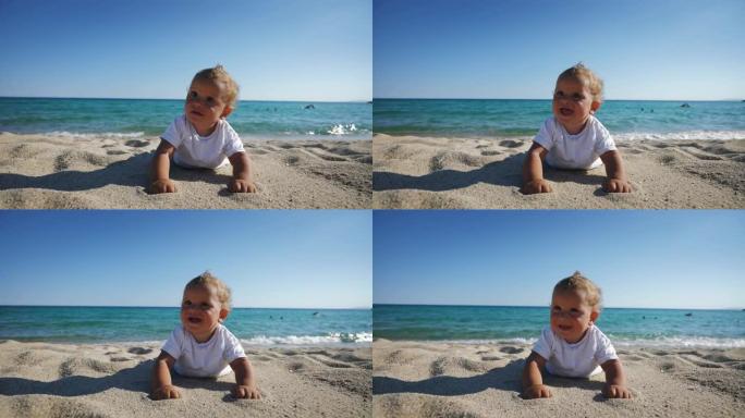 家庭度假期间，快乐微笑的蹒跚学步的男婴躺在沙滩上的真实照片