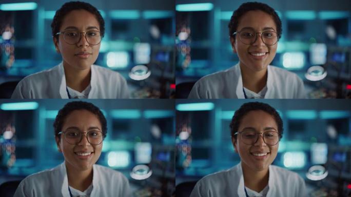 戴着眼镜的美丽的黑人拉丁女人迷人地看着相机。在实验室工作的年轻聪明的女科学家。科技Bokeh蓝色背景