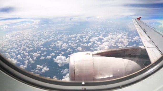 飞机窗蓝天白云天际线云团多多