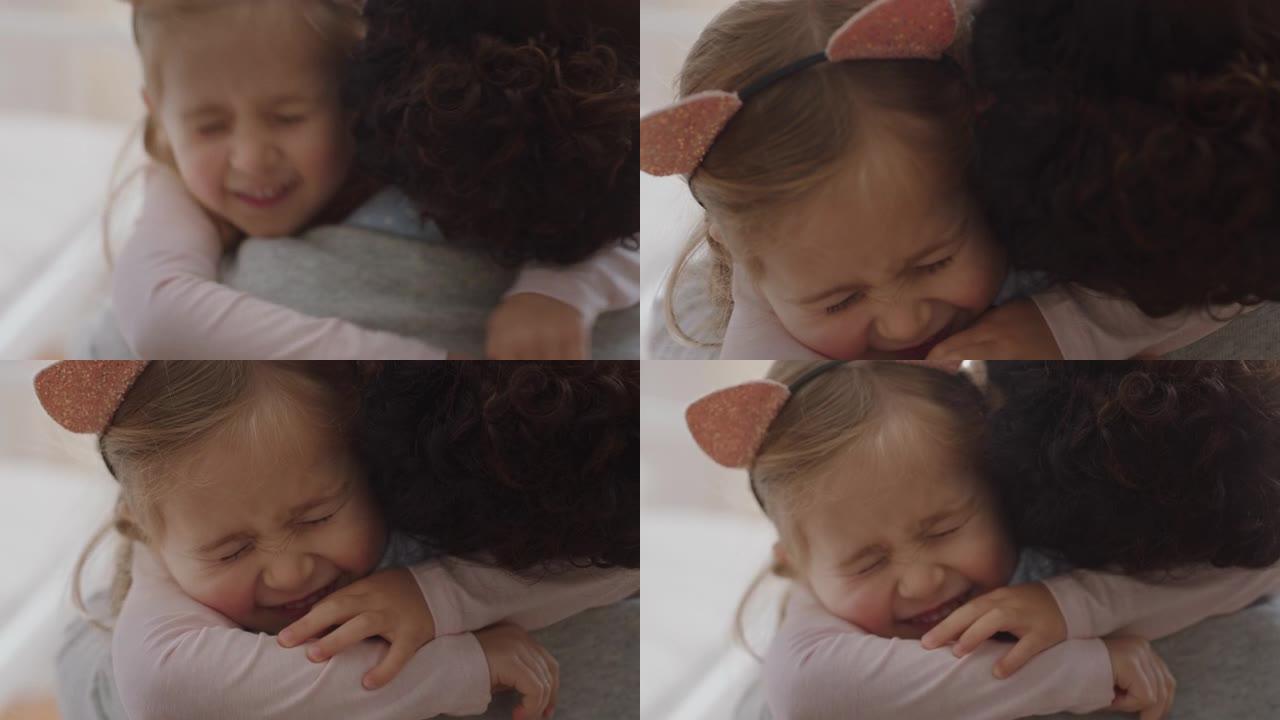 快乐的小女孩拥抱母亲微笑拥抱女儿爱孩子享受家庭亲情概念4k镜头